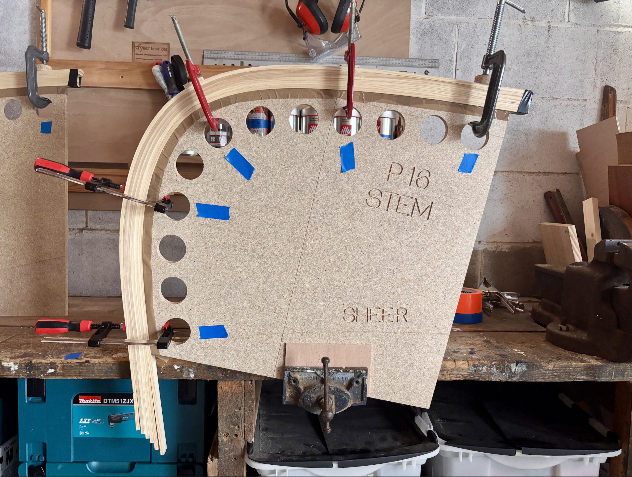 Ash strips clamped to a stem mould